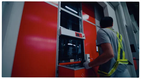 person working at machine